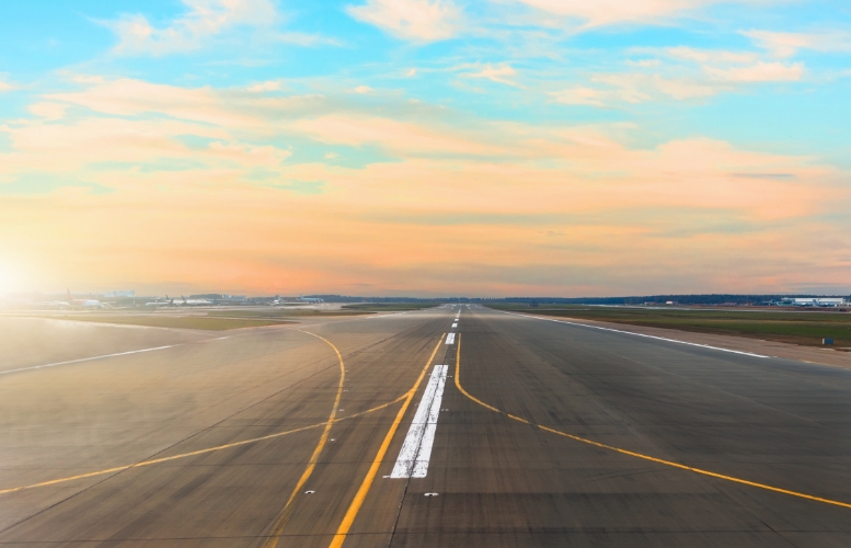Looking into the distance along an airport runway