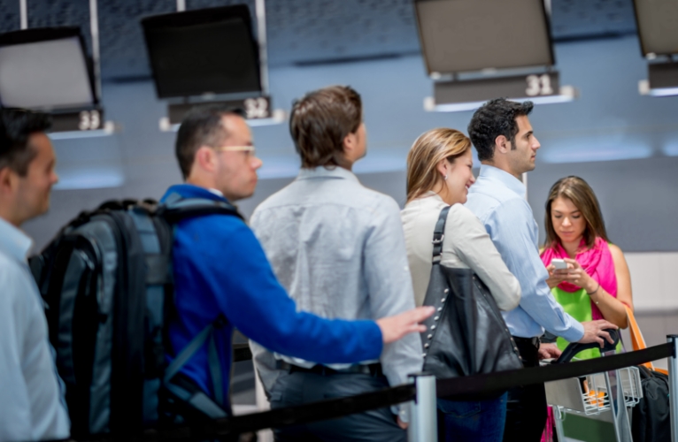 People queuing at airport for check in