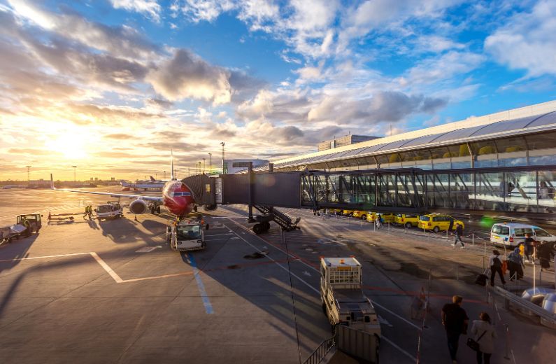Aeroplane at gate on airport apron