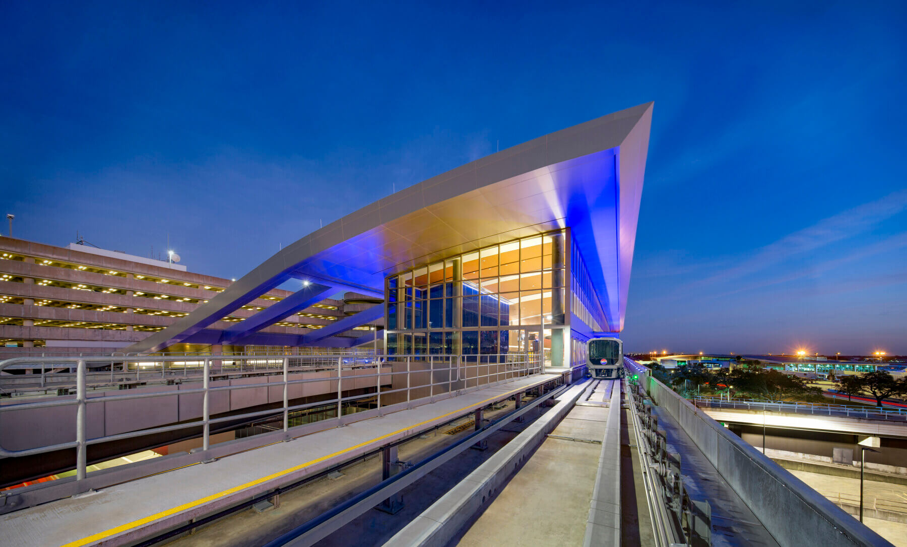 40030 tampa airport automated people mover station night 1800