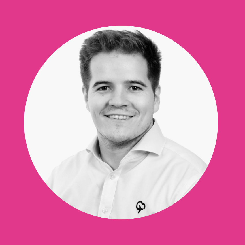 Headshot of Harry Carson with pink background